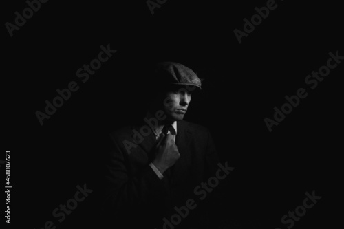 portrait of a man in the dark. black and white portrait © vov8000