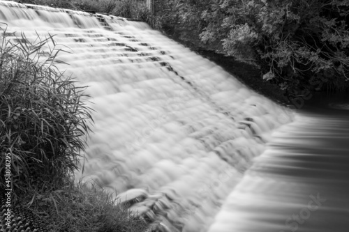 Long exposure of the waterfall at West Lydford weir in Somerset photo