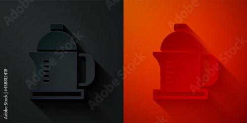 Paper cut French press icon isolated on black and red background. Paper art style. Vector