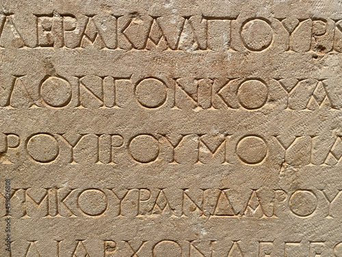 Old Greek writing on sandstone