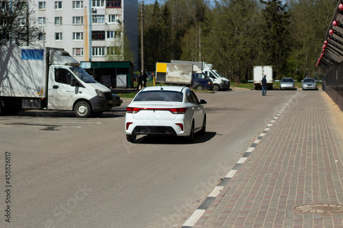 Car on the road. The car is on the street.