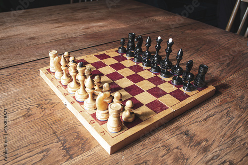 Chess board with chess. Wooden chess