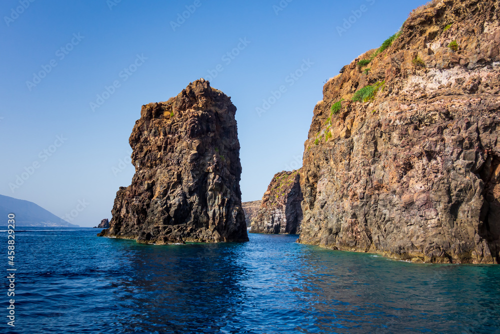 Lipari island (Aeolian archipelago), Messina, Sicily, Italy: view of the rocky seacoast. Lipari island (Aeolian archipelago), Messina, Sicily, Italy: view of the rocky seacoast.