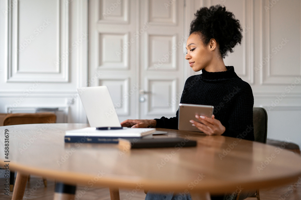 A woman answers clients ' emails. The designer is a confident workplace to surf the Internet. A stylish freelancer works remotely at home. Student training online on the website. A woman answers clients ' emails. The designer is a confident workplace to surf the Internet. A stylish freelancer works remotely at home. Student training online on the website.