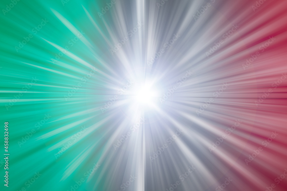 Bright flash in the center of diverse green, black and red background Bright flash in the center of diverse green, black and red background