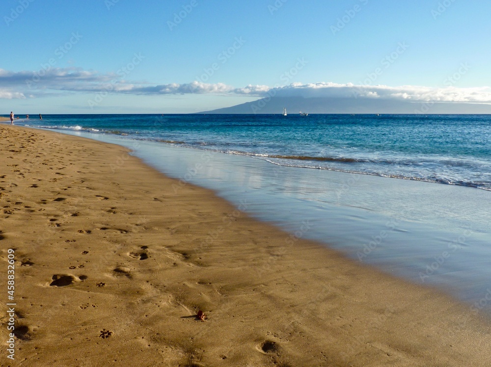 footprints on the sand in Queens Beach, Honolulu Hawaii footprints on the sand in Queens Beach, Honolulu Hawaii