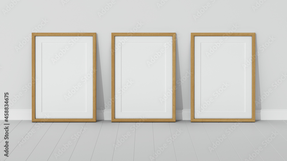 Three wooden frames on wooden floor with a white wall. Empty interior. 3D render vertical wooden frame mock up. White parquet. 3D illustrations. 3D design interior. Triptych. Passe partout frame. - obrazy, fototapety, plakaty 