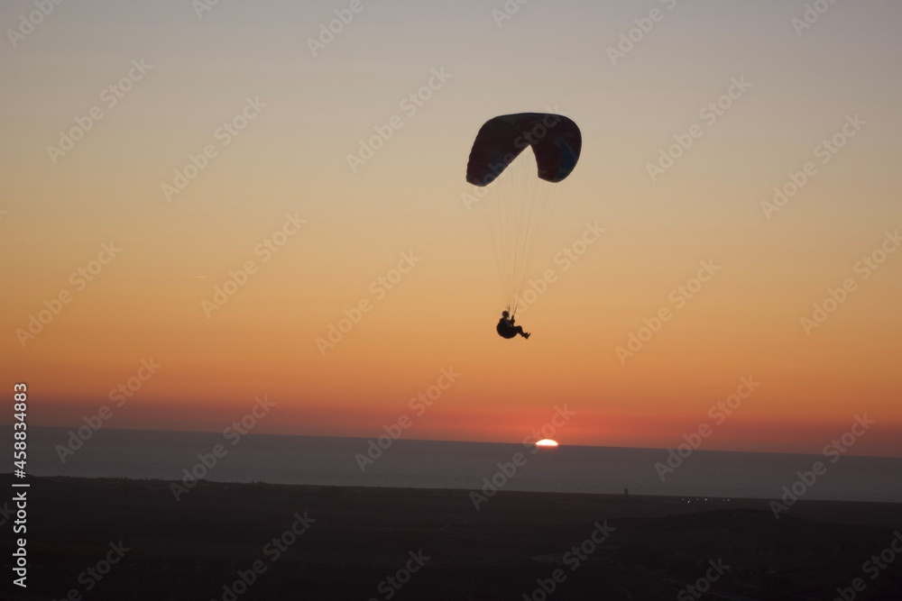 Parachute flight in the sunset Parachute flight in the sunset