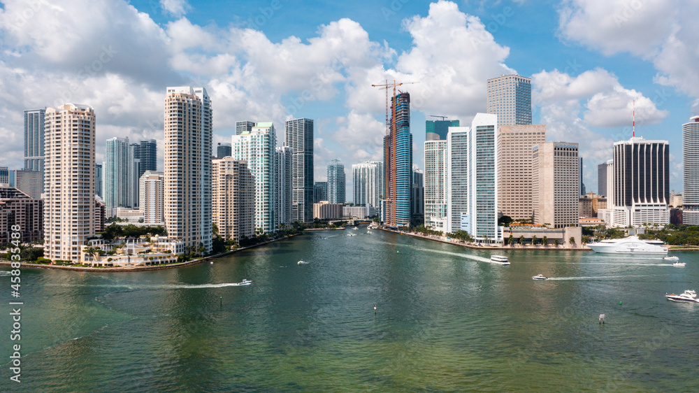Miami, FL USA - 9-18-2021: Downtown Miami cityscape shot over the ocean. Miami, FL USA - 9-18-2021: Downtown Miami cityscape shot over the ocean.