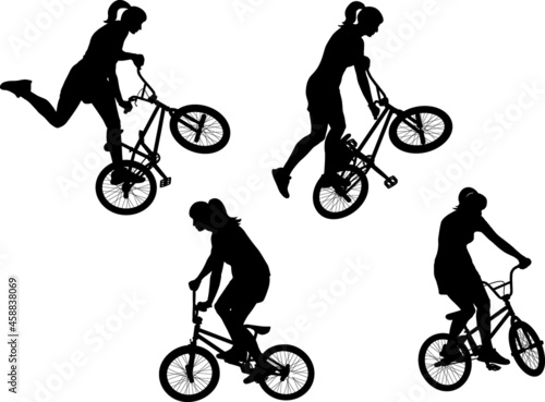 BMX cyclist, woman silhouettes