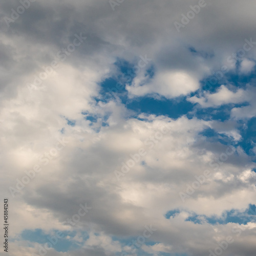 Blue sky background with clouds © Mario