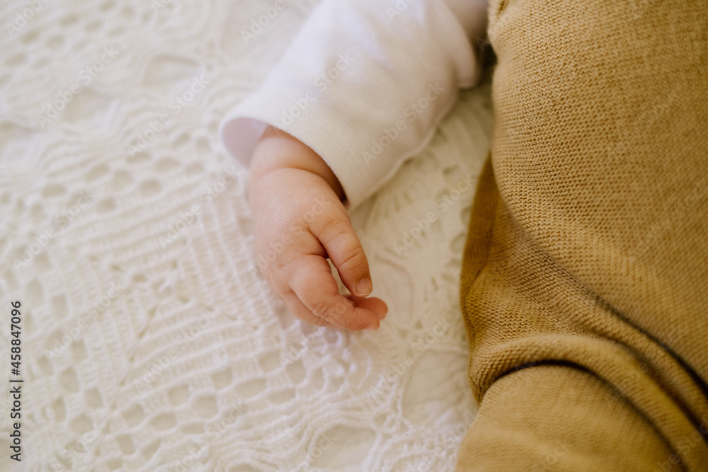 Newborn Baby Hands on Neutral and Soft Background Newborn Baby Hands on Neutral and Soft Background