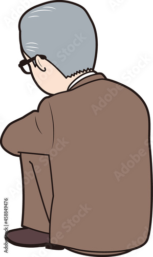 膝を抱えるシニア男性会社員