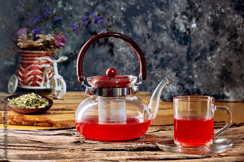 Red berry tea table in a rustic setting