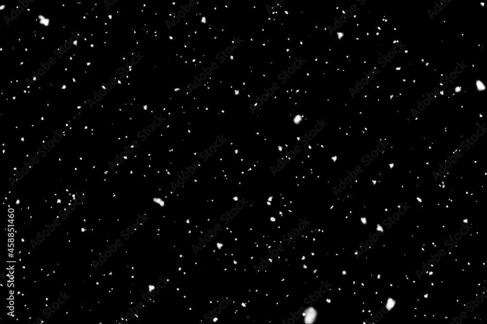 snow fall concept. Falling raindrops or snow against a black background snow fall concept. Falling raindrops or snow against a black background