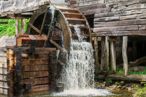 Old water mill, mill wheel on the river