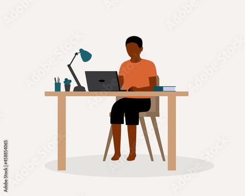 Young Black Boy Doing His Homework At Home. Online School During COVID-19 Pandemic. Remote School Education. Distance Learning.
