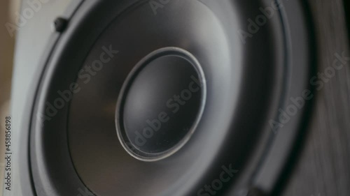 Speaker cone in out pumping from bass sound. Vibrating loud sound speaker. Loopable. photo
