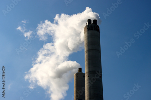 Steam from the chimney of waste incineration AEB in Amsterdam photo