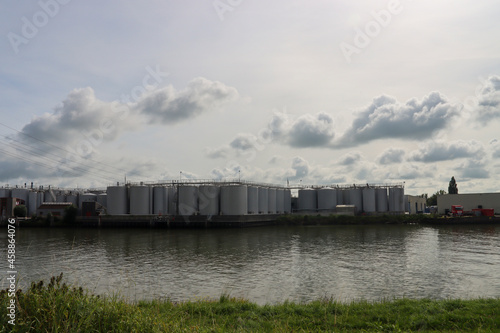 Oil tanks along the river Hollandsche IJssel at Capelle aan den Ijssel photo