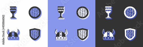 Set Shield, Medieval goblet, Viking in horned helmet and Round wooden shield icon. Vector