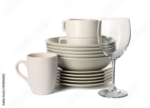 Set of light clean dishes on white background