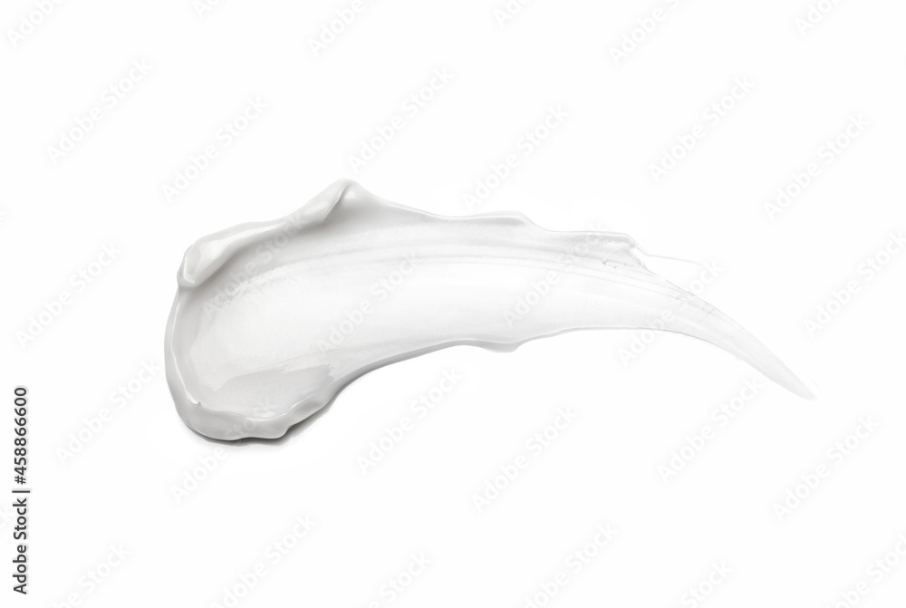 White cosmetic cream smear isolated on white White cosmetic cream smear isolated on white