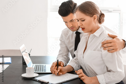 Obraz na plátně Boss harassing his secretary in office