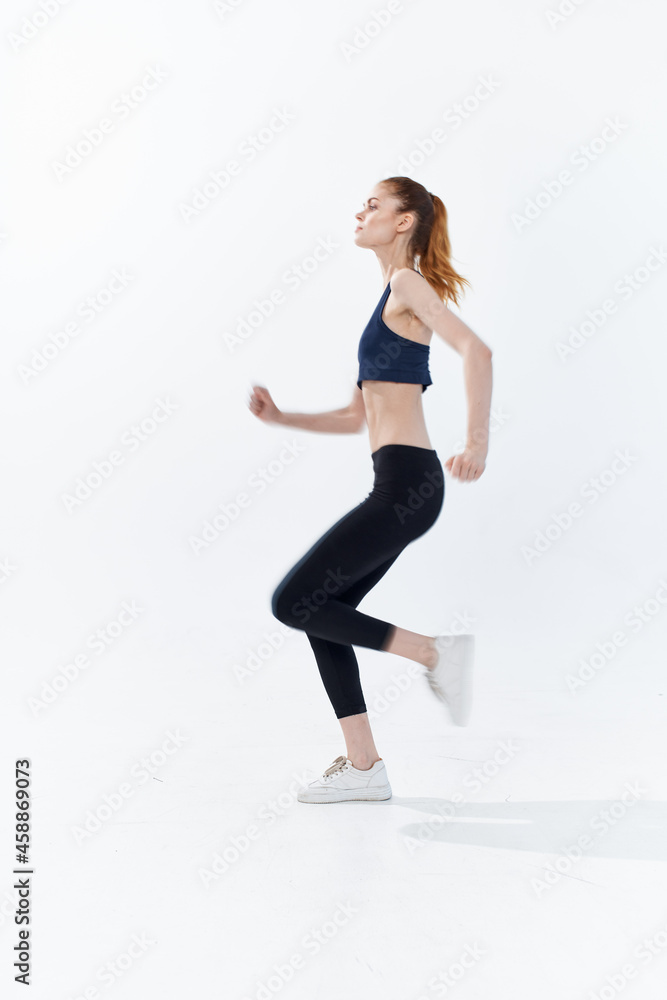 athletic woman workout active sport jumping light background