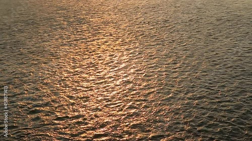 Top view of the water surface with small waves.