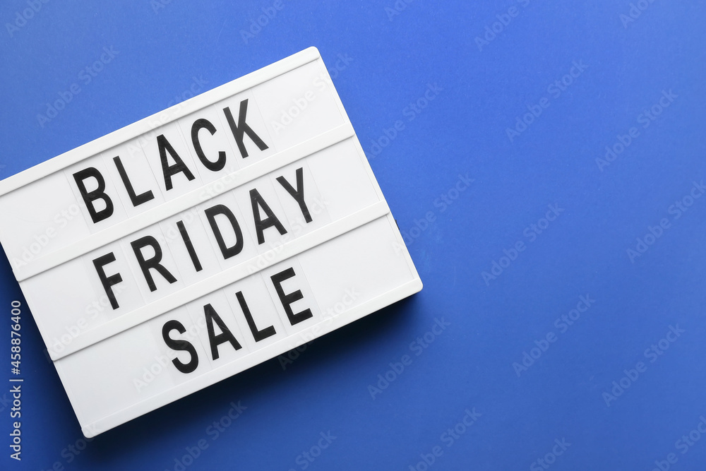 Board with text BLACK FRIDAY SALE on color background Board with text BLACK FRIDAY SALE on color background