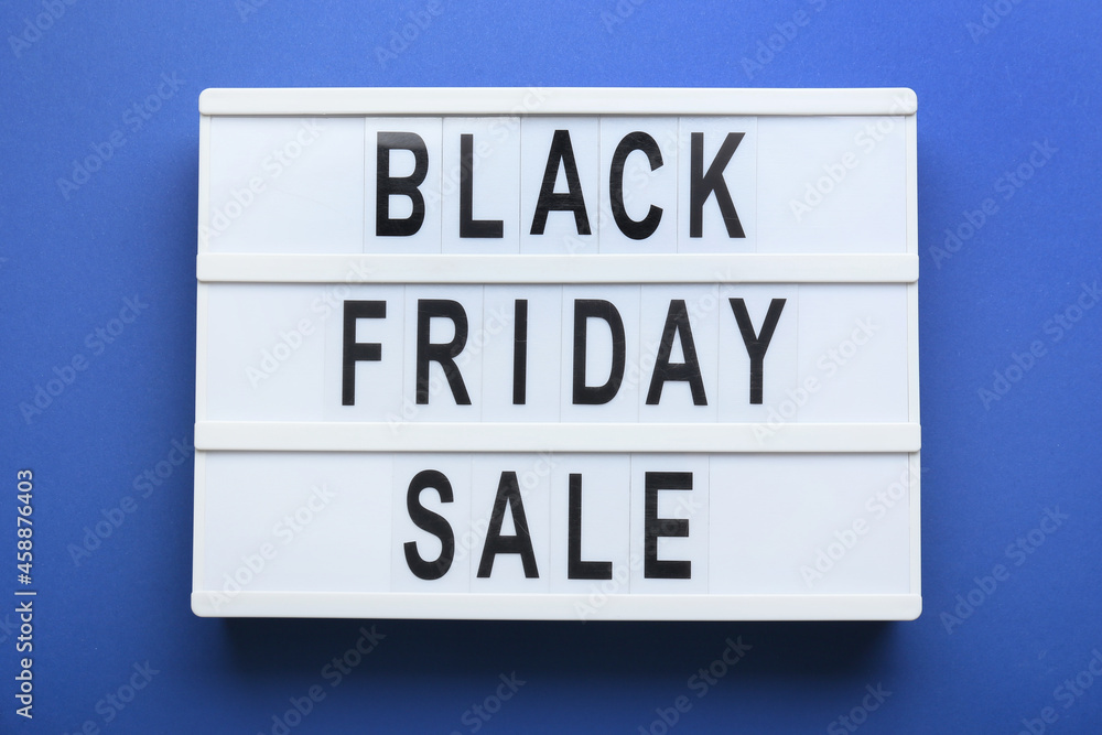 Board with text BLACK FRIDAY SALE on color background Board with text BLACK FRIDAY SALE on color background