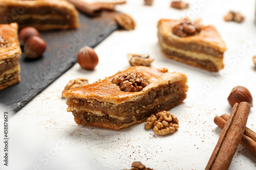 Tasty baklava on light background