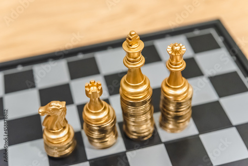 Closeup of chess characters on board games. to represent decision making in term of business strategy to find out the best solution to meet target objective and goal. 