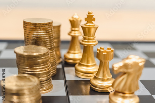 Finance and money exchange investment as concept. Gold coins stacks is representing riches and wealth management. Coin stack growing and find out the way to get a return on investment. 
