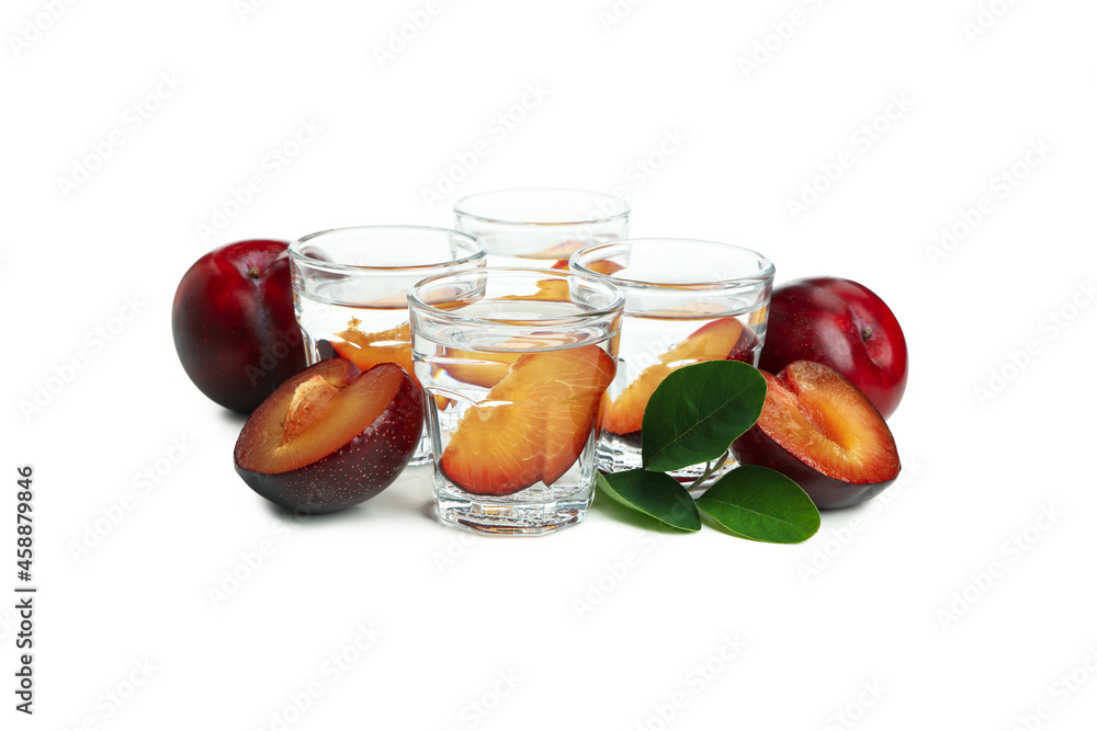 Plum vodka shots isolated on white background Plum vodka shots isolated on white background