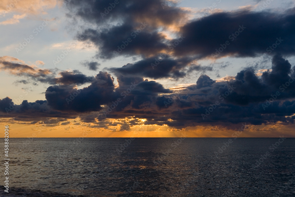 Clouds in the sky and sea at sunset.