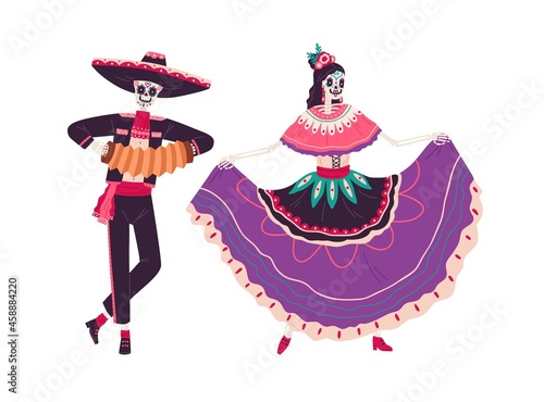 Couple of Mexican skeletons, man and woman dance to music on Day of Dead in M...