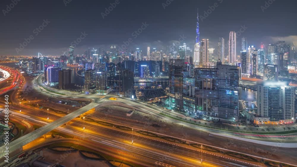 Panoramic skyline of Dubai with business bay and downtown district night timelapse. Panoramic skyline of Dubai with business bay and downtown district night timelapse.