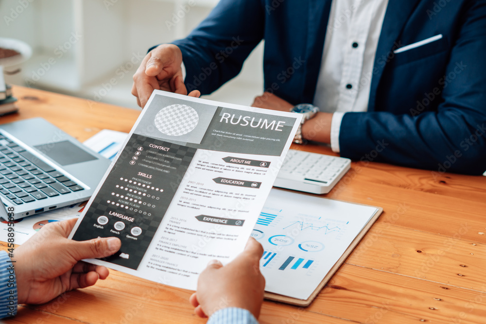Close up interviewer interview candidate apply for job at meeting room in office. Close up interviewer interview candidate apply for job at meeting room in office.