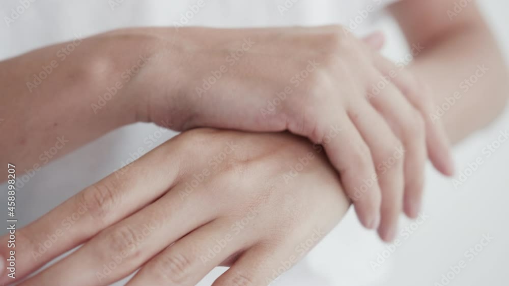 Young Adult Woman Hands Care Cream Close-up. Concept Anti-Aging Nature Cosmetics. Girl Apply Cream on Skin and Massage Arm for Day Fresh Softness. Daily Morning Moisturising Hydration Vitamin Creme Young Adult Woman Hands Care Cream Close-up. Concept Anti-Aging Nature Cosmetics. Girl Apply Cream on Skin and Massage Arm for Day Fresh Softness. Daily Morning Moisturising Hydration Vitamin Creme