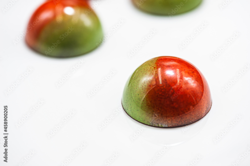 Assortment of chocolate candies sweets isolated on a background Assortment of chocolate candies sweets isolated on a background
