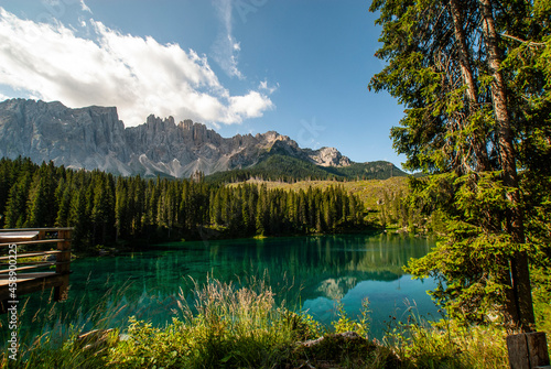 Fototapeta Naklejka Na Ścianę i Meble -  Carezza lake in front of Latemar, Lago di Carezza, Carezza, Dolomites, Trentino Province, Province of South Tyrol, August 2021, Italy