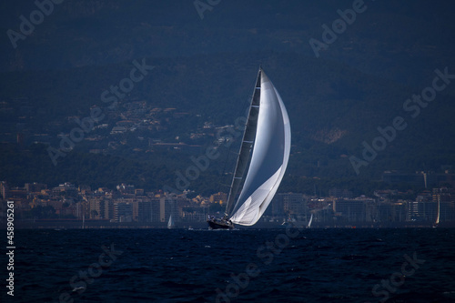 Maxi yacht sailing in the bay of palma de mallorca