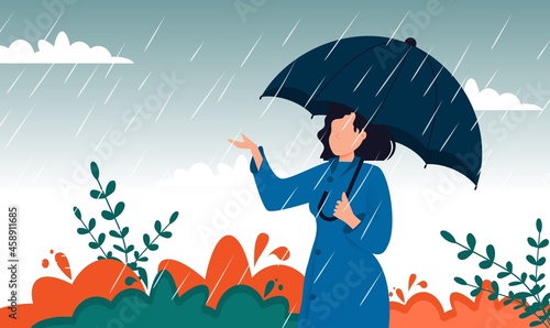 Autumn landscape city woman umbrella rain puddles of yellow trees. Enjoying autumn days. Woman in raincoat walking down the street. Girl umbralla walking under the rain.