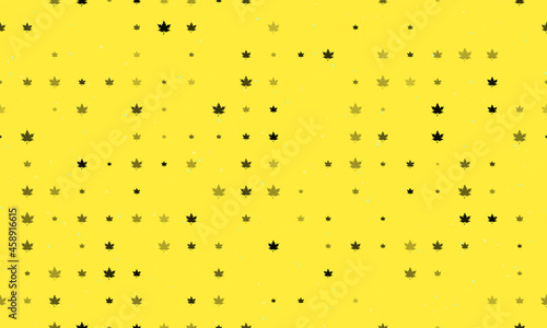 Seamless background pattern of evenly spaced black maple leafs of different sizes and opacity. Vector illustration on yellow background with stars