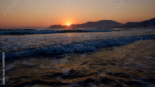 Spawning place of Caretta Caretta turtles  Iztuzu beach. Golden sun rays reflecting off the sea at sunset. Spectacular sunset at the meeting point of the Mediterranean and Aegean.