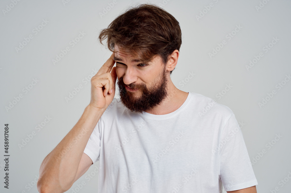 man holding his head pain stress emotions Studio treatment man holding his head pain stress emotions Studio treatment