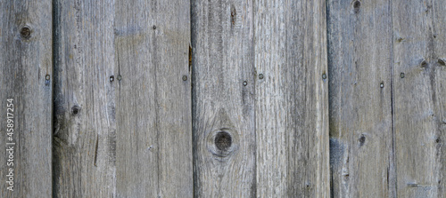 Natural wood with a fine structure, photographed outdoors in daylight