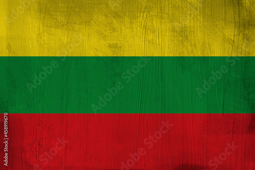 Patriotic wooden background in color of Lithuania flag © Julia